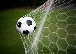 soccer ball in goal net 123